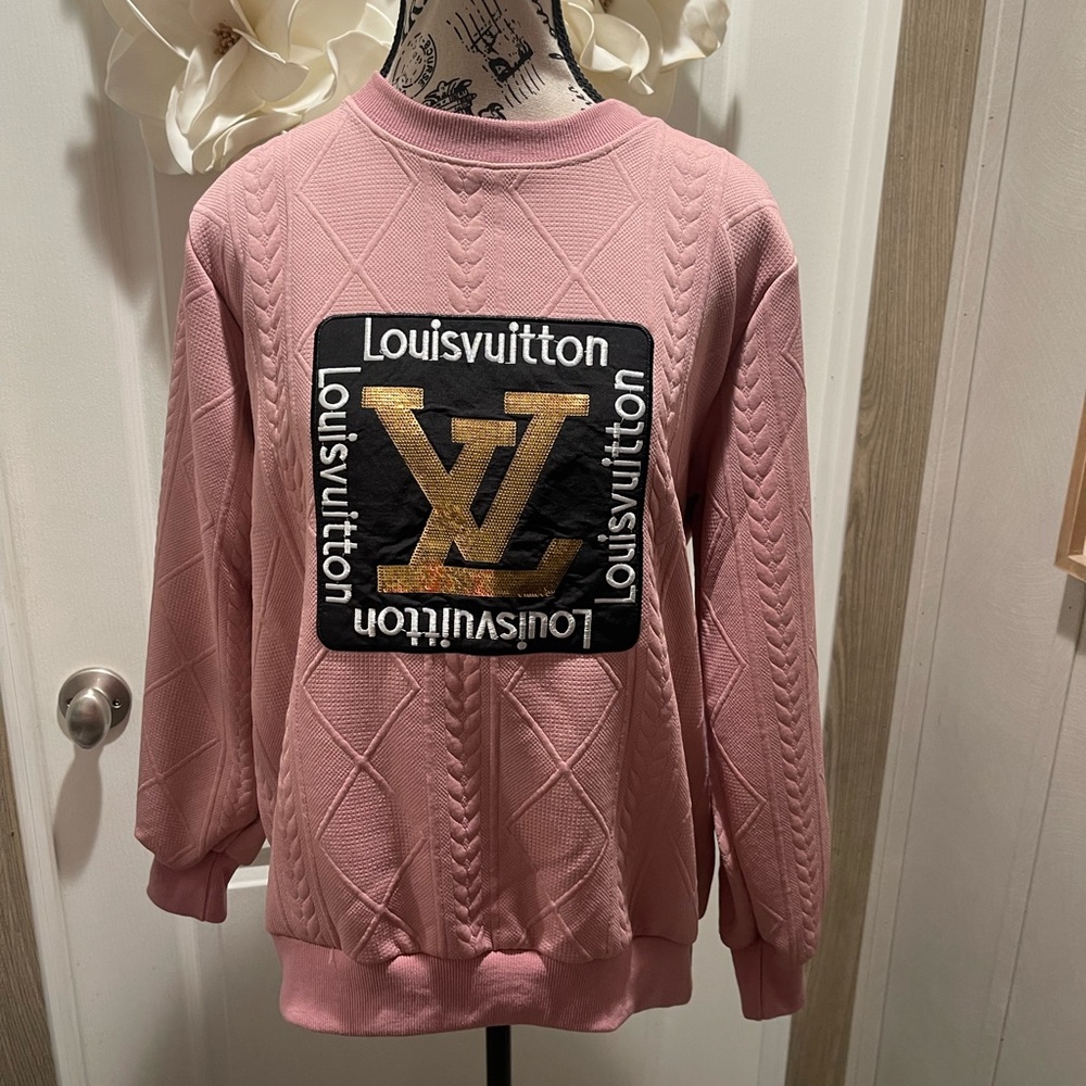 Beautiful boutique sweater with bling